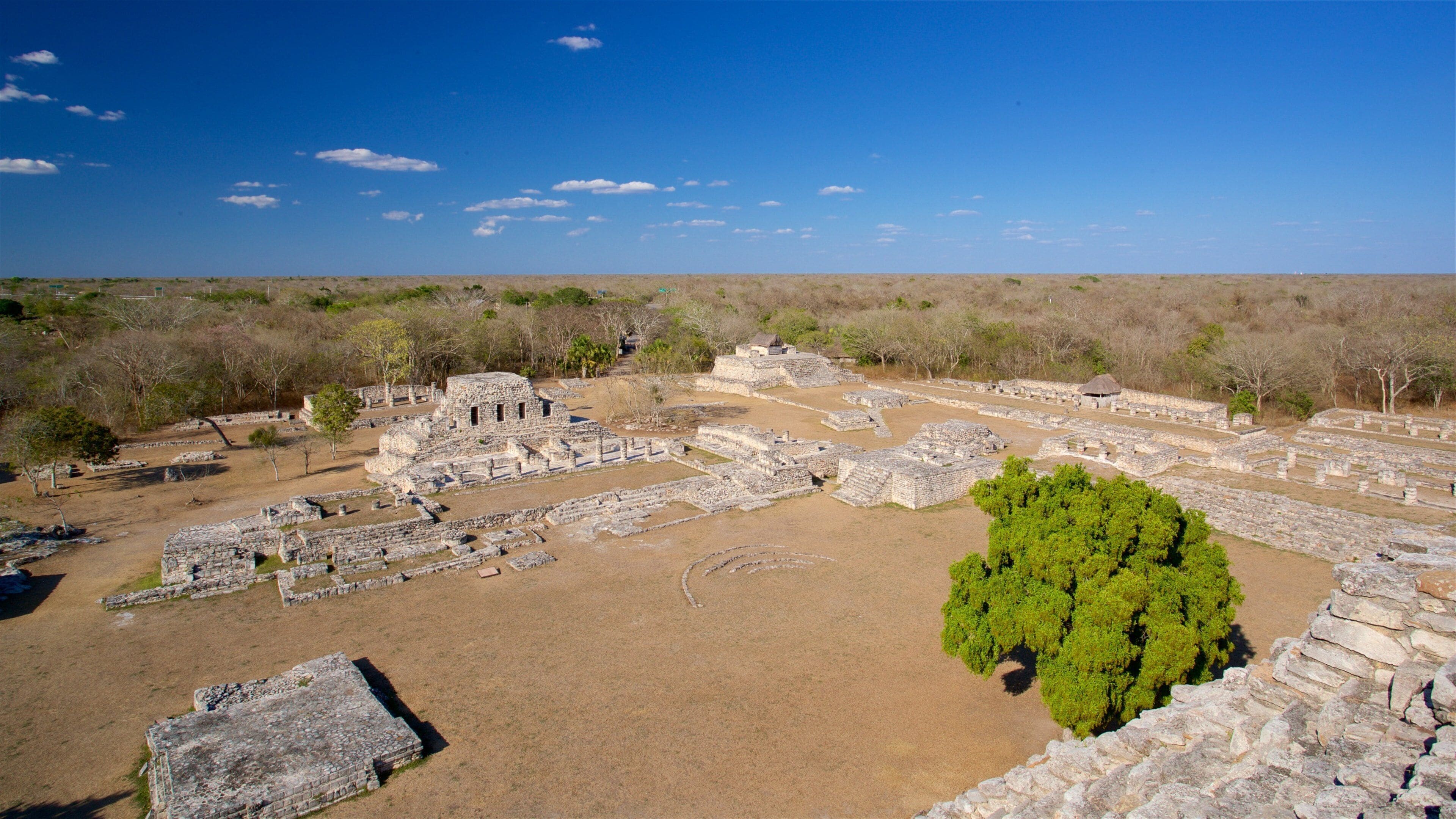 Mayapan Mayan Ruins showing landscape views, tranquil scenes and heritage architecture