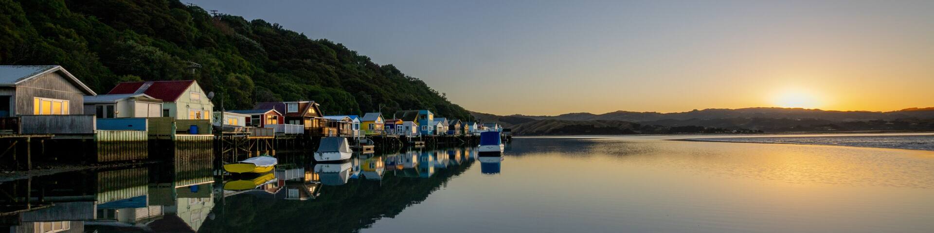 Colorful Boatsheds Reflected at Sunrise, Paremata, Porirua Harbour, New Zealand