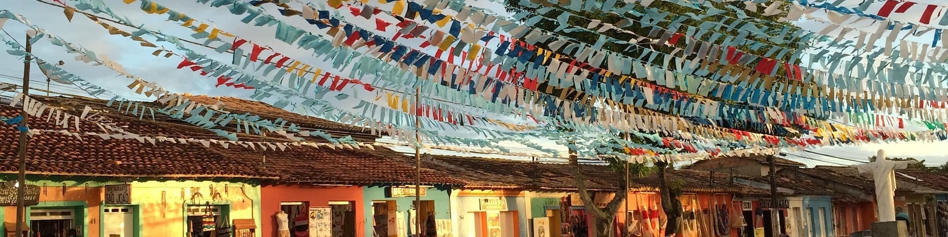 This square is decorasted for Junine Festivities. At sunset color are even brighter. Take your time to relax in this country side atmosphere.