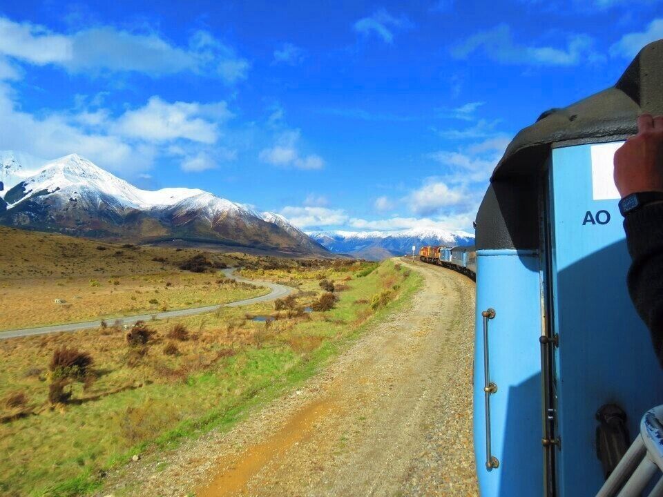 📍Tranzalpine Crossing, New Zealand

We took the train from Greymouth to Christchurch, stayed overnight then returned the next day. From the comfort of world class carriages, see the fields of the Canterbury Plains and farmland, followed by the spectacular gorges and river valleys of the Waimakariri River. Your train then climbs into the majestic Southern Alps to Arthurs Pass National Park, before descending through lush beech rainforest to the West Coast town of Greymouth – a great base for visits to Punakaiki and the always-popular glaciers.

