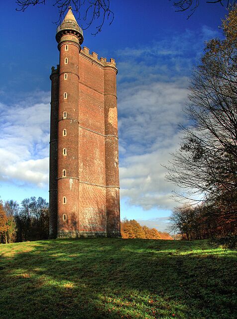 Alfred's Tower A triangular commemorative folly with circular turrets at each corner, it was completed in 1766 by Henry Hoare (the Younger) of Stourhead in tribute to the achievements of King Alfred. There is a larger than life sized statue of King Alfred on the other side of the tower. Grade I Listed.