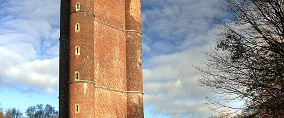Alfred's Tower A triangular commemorative folly with circular turrets at each corner, it was completed in 1766 by Henry Hoare (the Younger) of Stourhead in tribute to the achievements of King Alfred. There is a larger than life sized statue of King Alfred on the other side of the tower. Grade I Listed.
