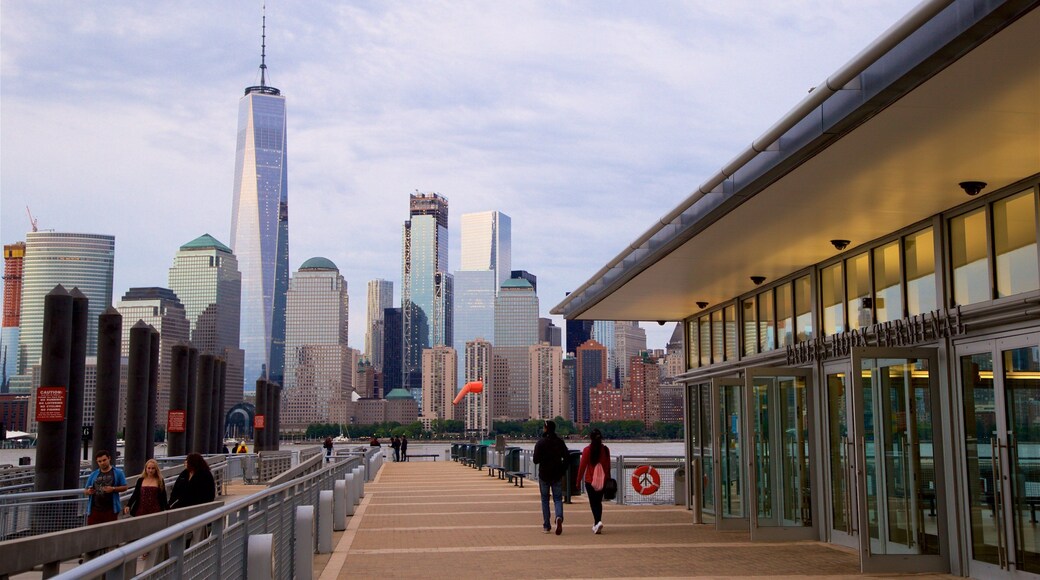 Hudson River Waterfront Walkway featuring street scenes, a city and a high rise building