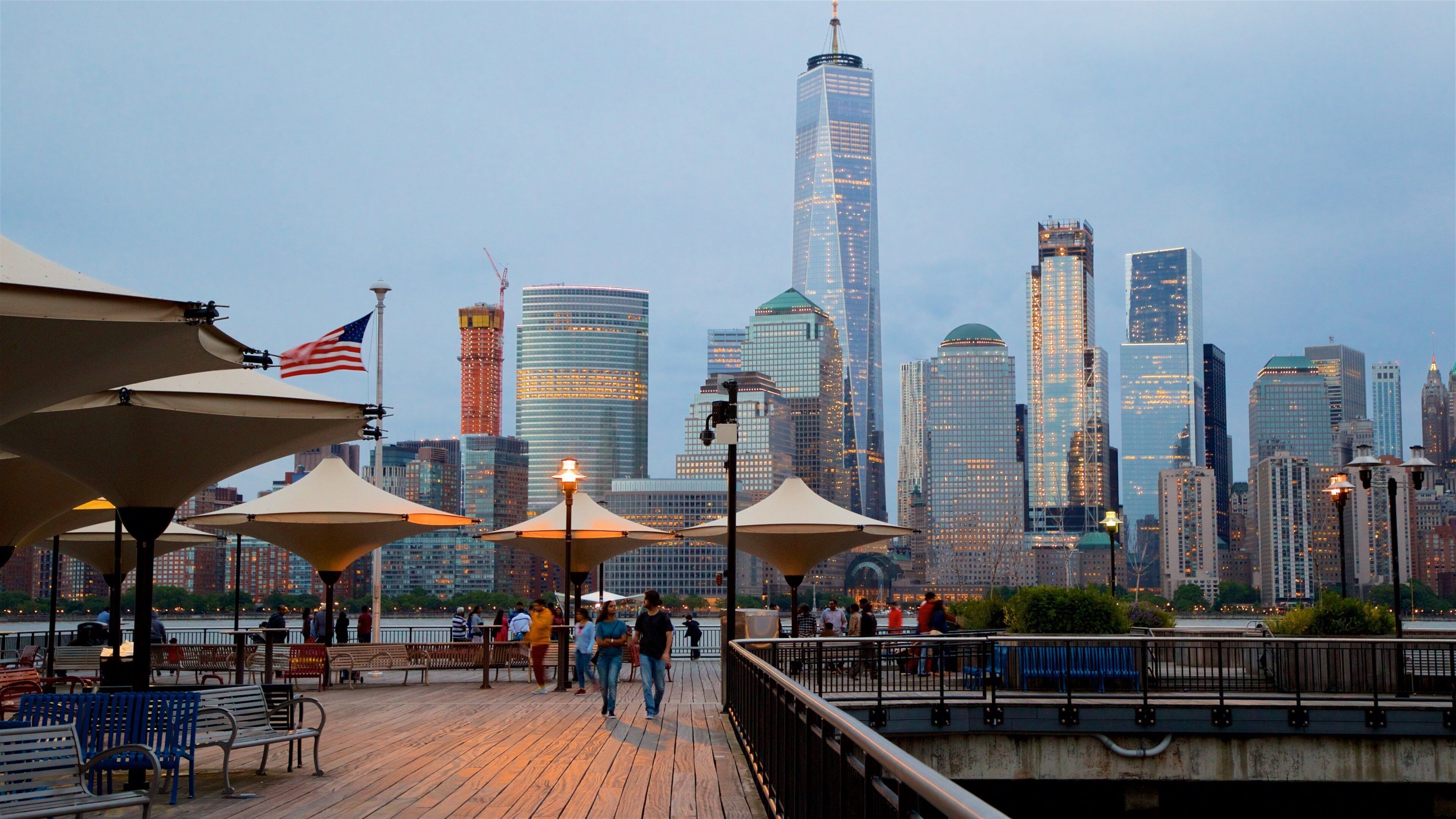 Hudson River Waterfront Walkway featuring a high rise building, a city and night scenes