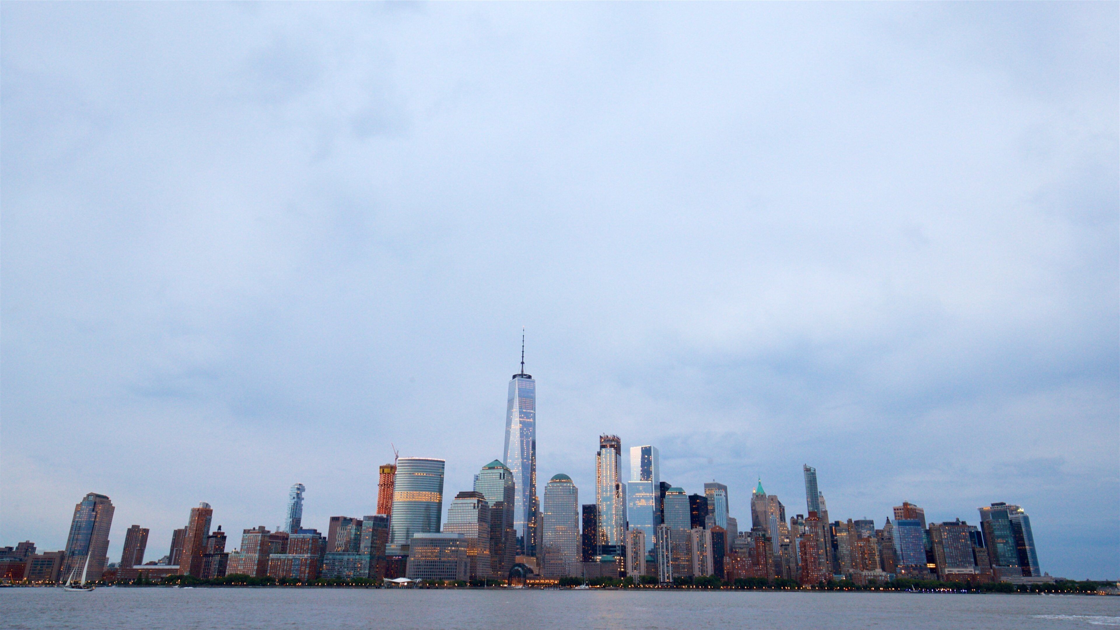 Jersey City showing a city, a skyscraper and a river or creek
