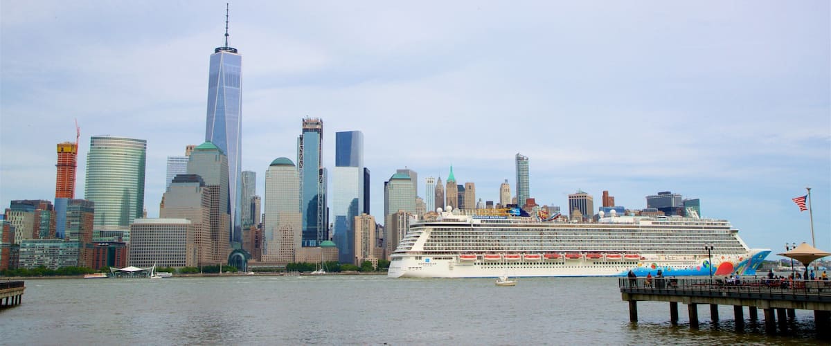 Hudson River Waterfront Walkway featuring a high rise building, a city and cruising