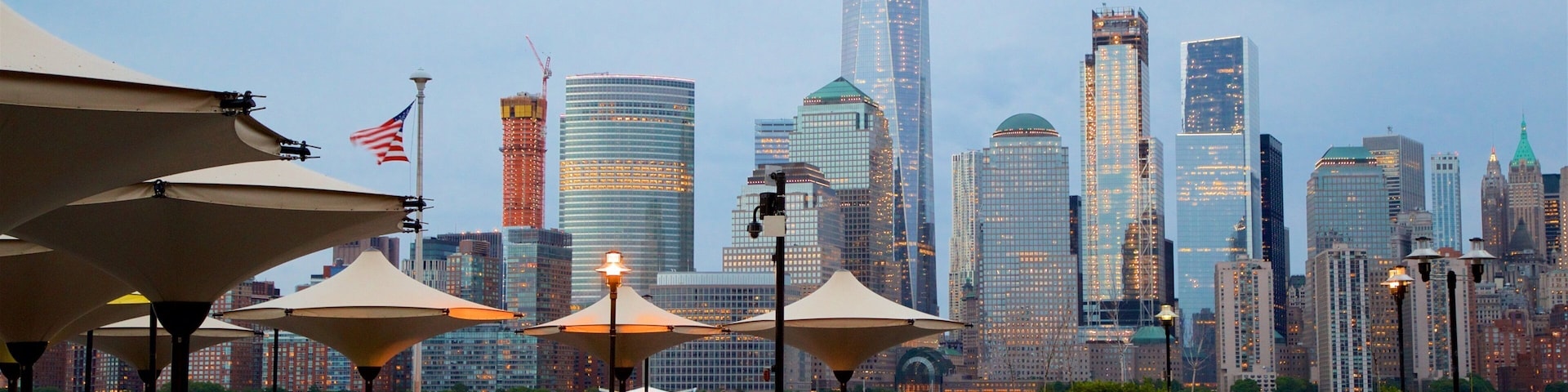 Hudson River Waterfront Walkway which includes a city, street scenes and a high rise building