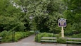 A park entrance with a sign for Essex County Branch Brook Park.