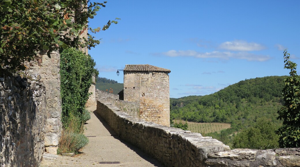 Puycelsi. City walls. Wall-walk, with the Prison Tower in the background.