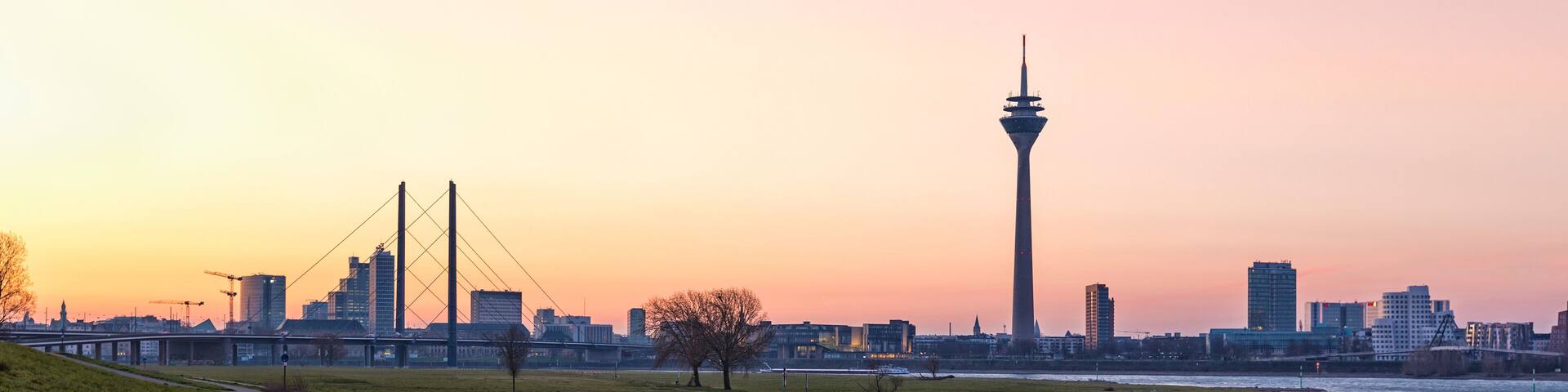 Düsseldorf at sunrise, view from Oberkassel to Friedrichstadt and MedienHafen quarters