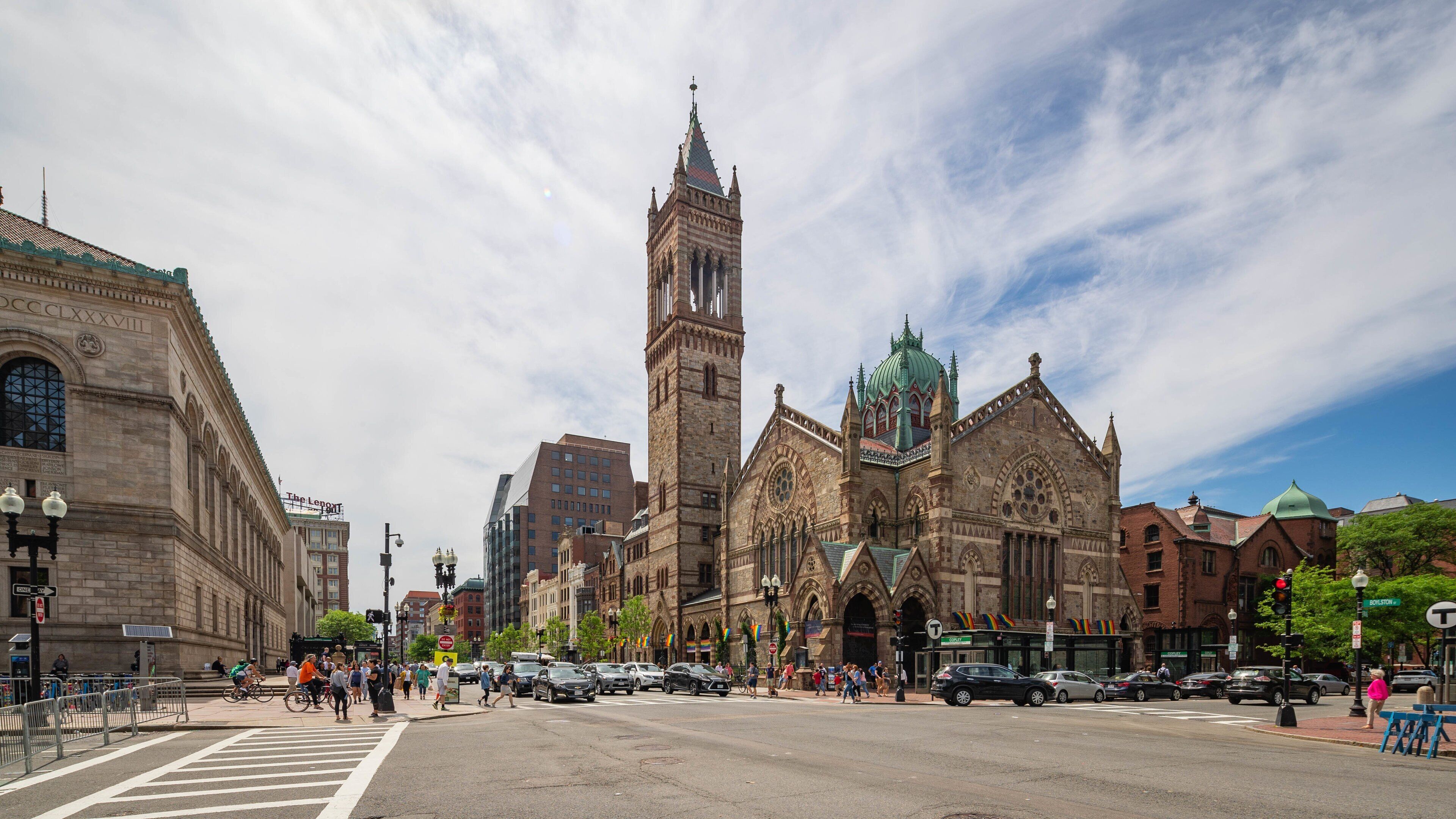 A historic church with a tall tower and stained glass windows.