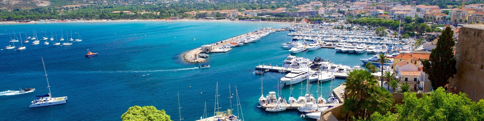 Chapelle de Notre Dame de la Serra which includes a marina and a coastal town