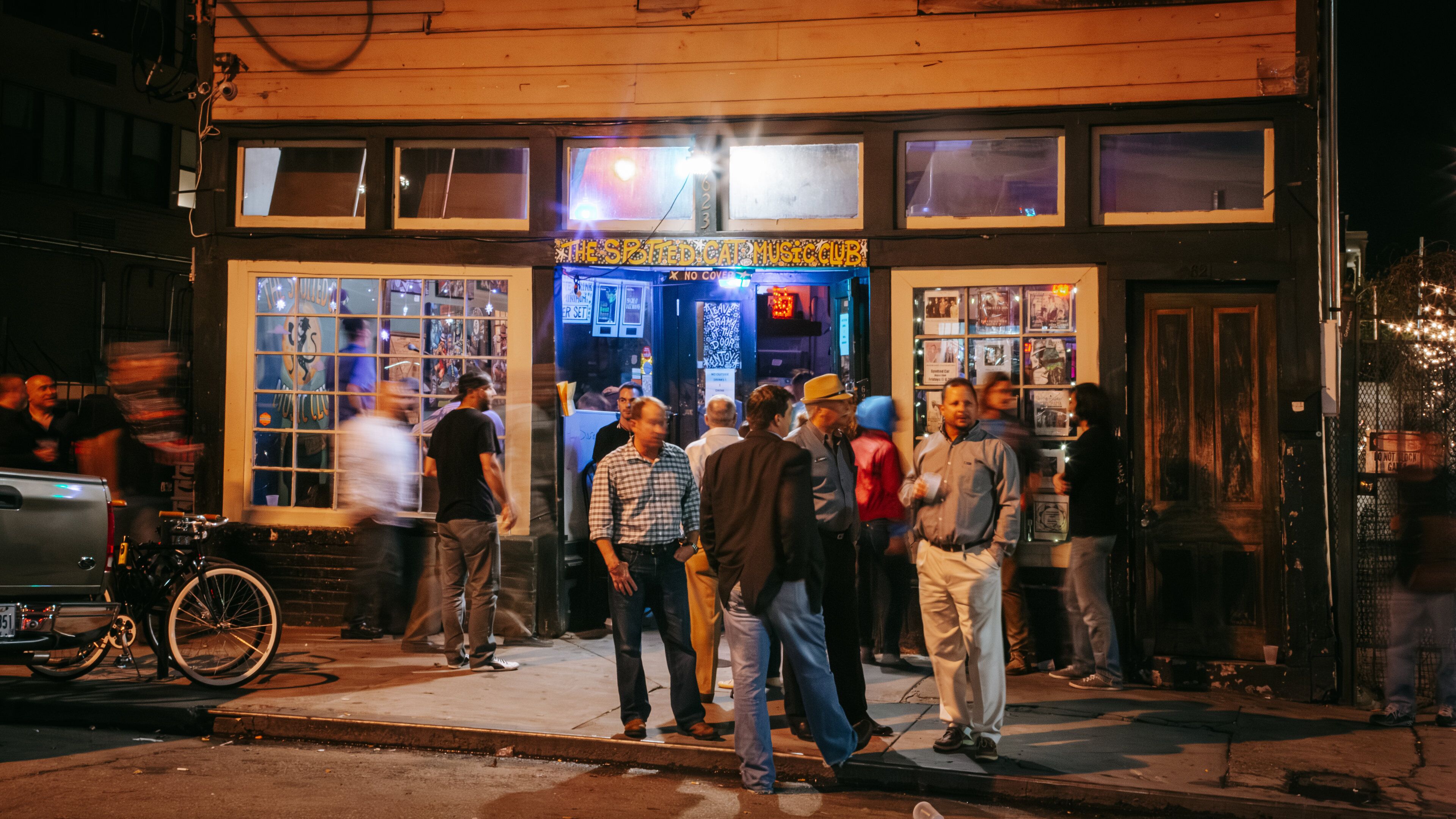 Frenchmen Street which includes nightlife, night scenes and street scenes
