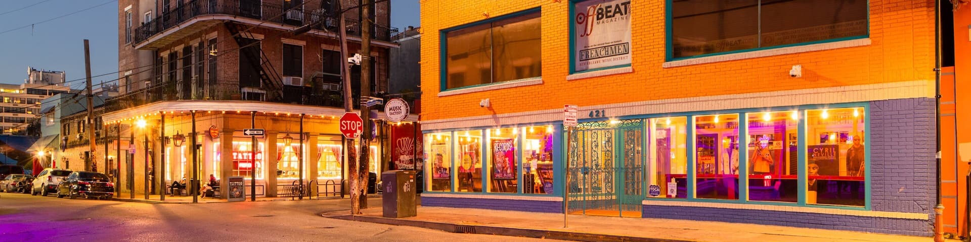 Frenchmen Street showing night scenes, a small town or village and street scenes