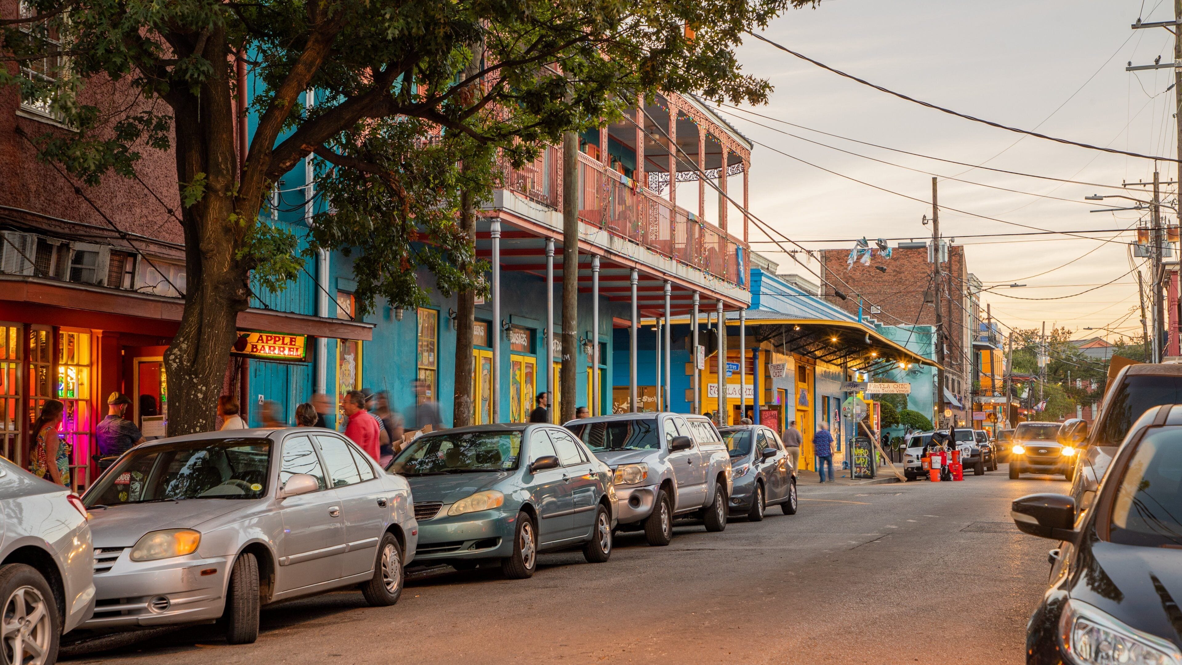 Frenchmen Street which includes street scenes and a sunset