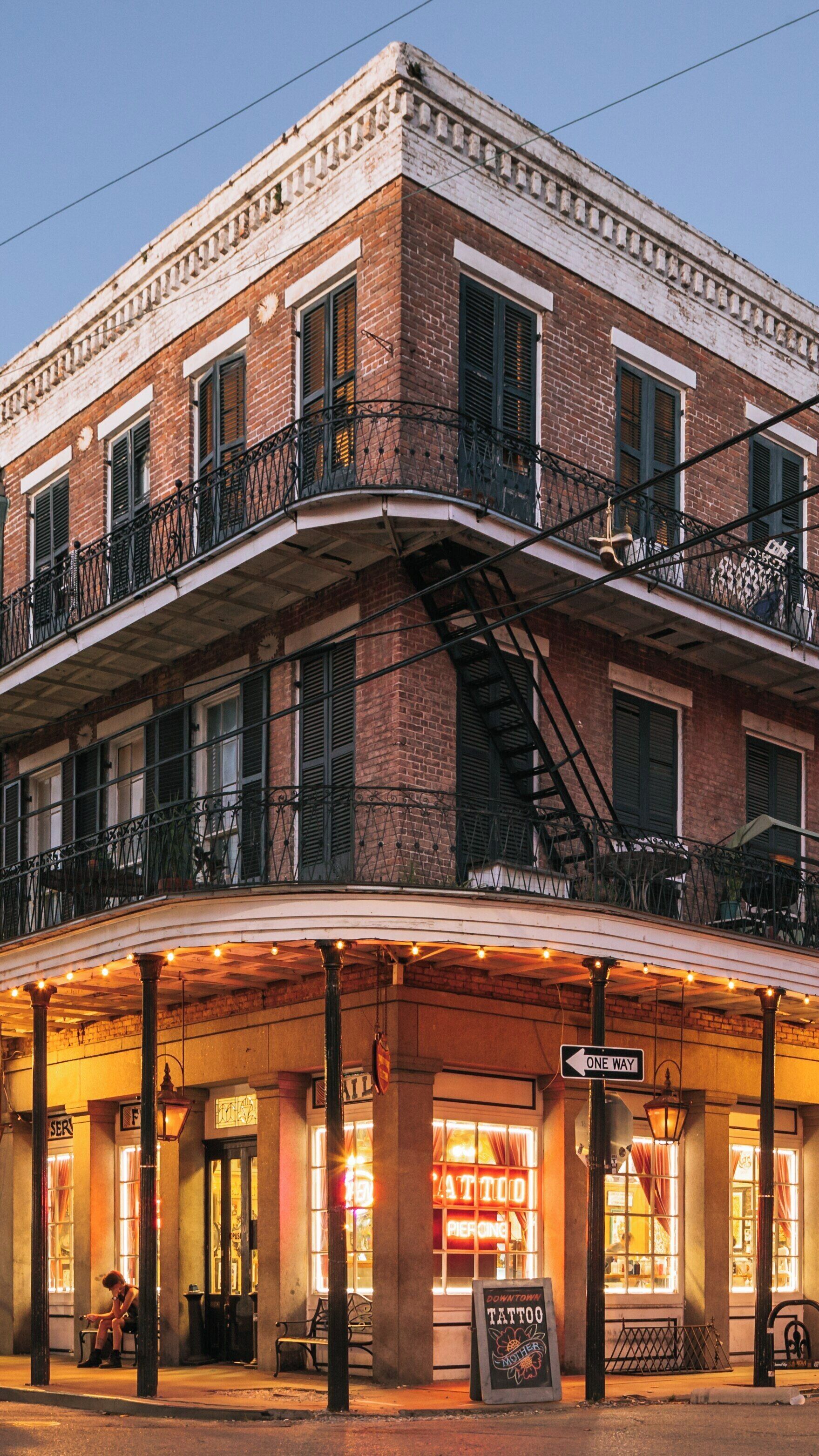 Charming evening view of Frenchmen Street in Faubourg Marigny, New Orleans showcasing local architecture and vibrant nightlife