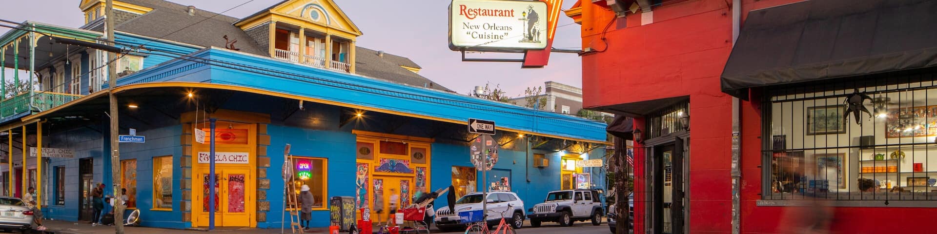 Frenchmen Street showing signage, a small town or village and street scenes