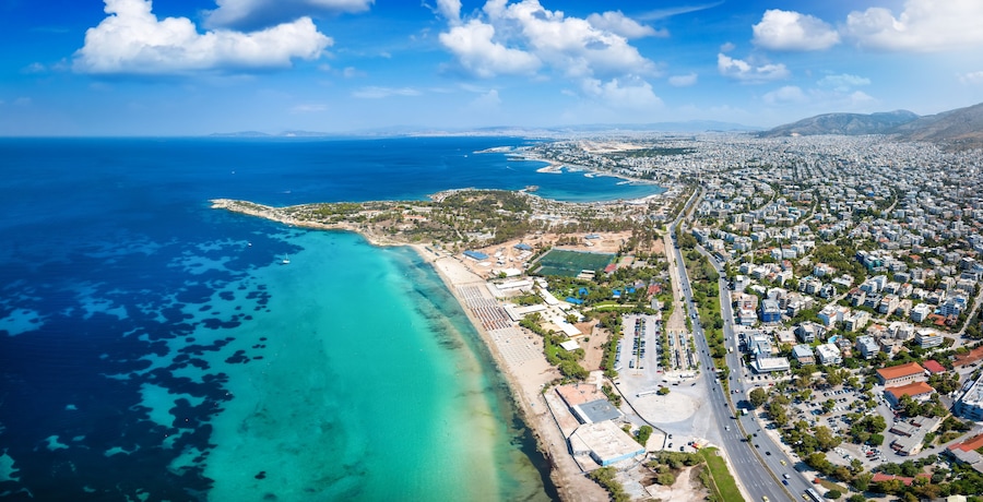 Aerial view of the beautiful coast of Voula, part of the Athens riviera, Greece, with the first public beach and turquoise sea