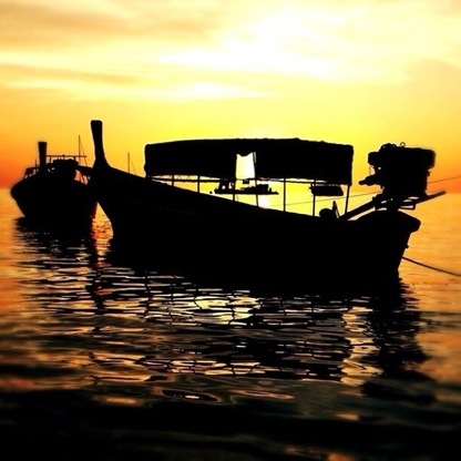 Sunset by the Longtail boats in Koh Lipe