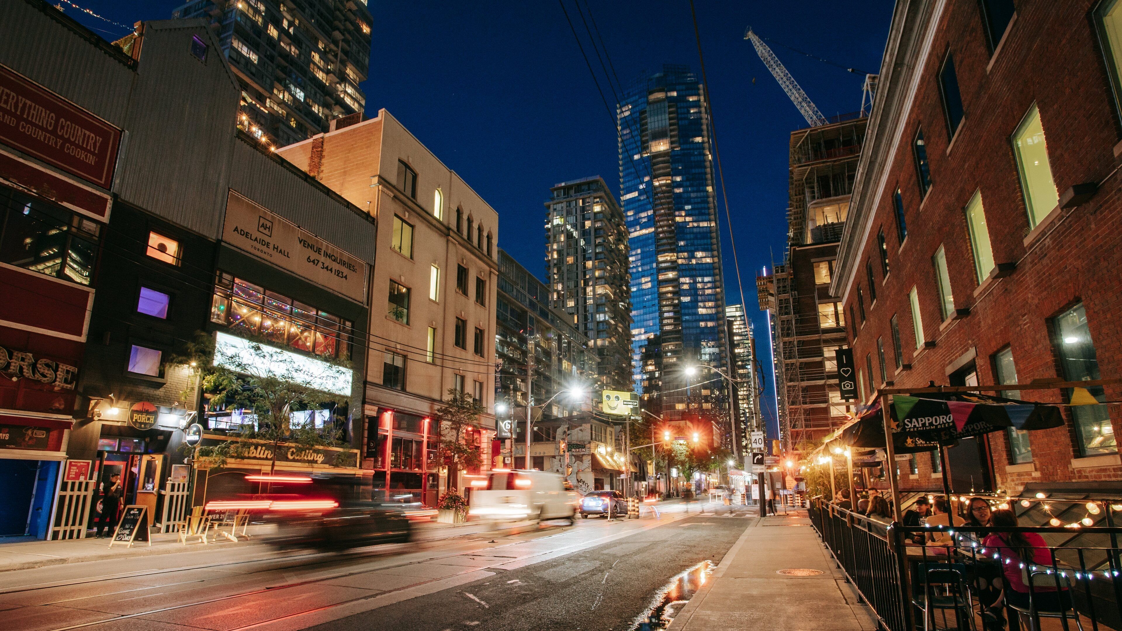 Toronto Entertainment District featuring a city and night scenes