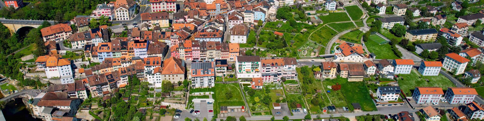Panoramic aerial of the old town of the city Orbe in Switzerland on a sunny noon in summer