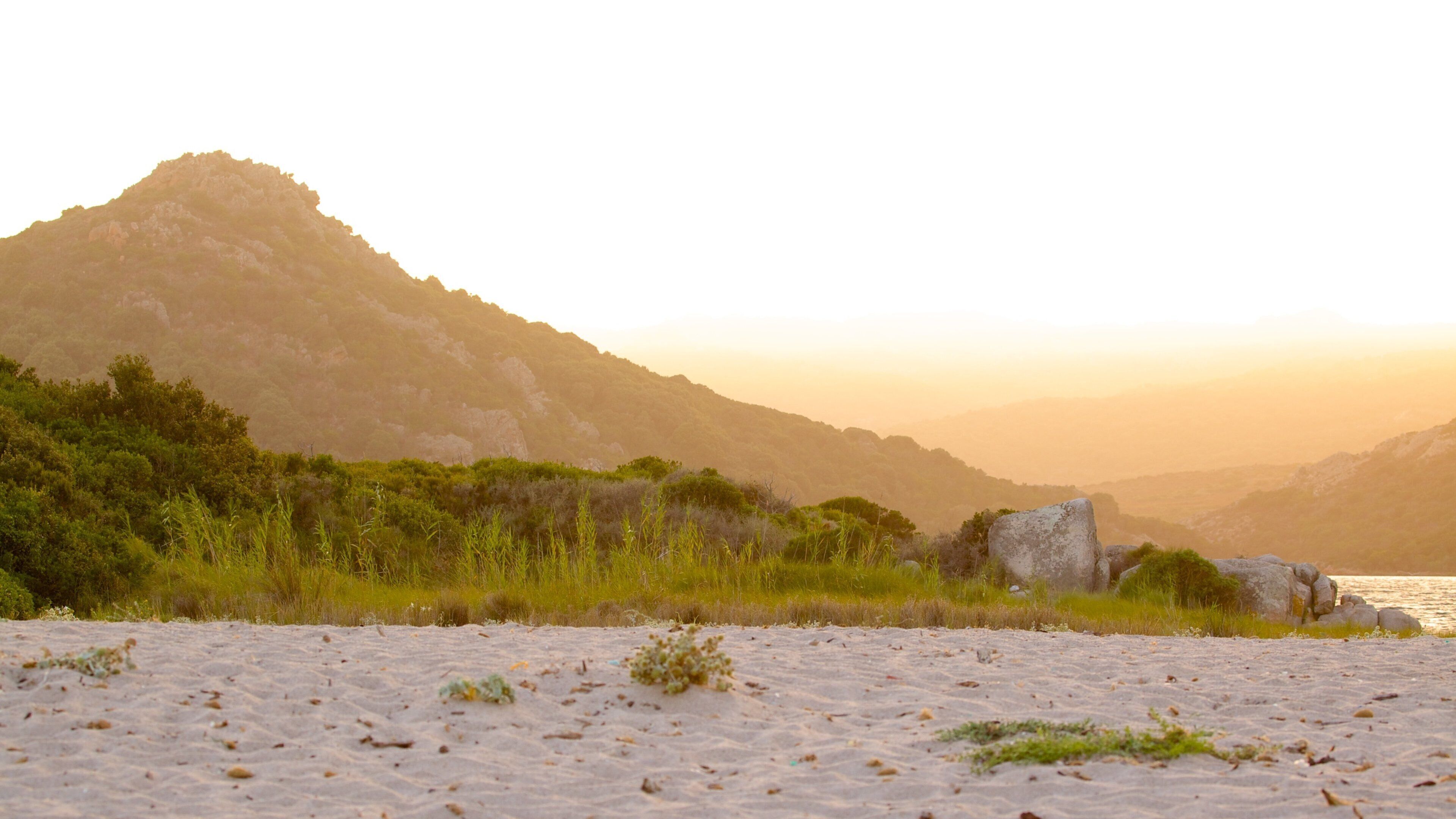 Balistra Beach showing a sandy beach and a sunset