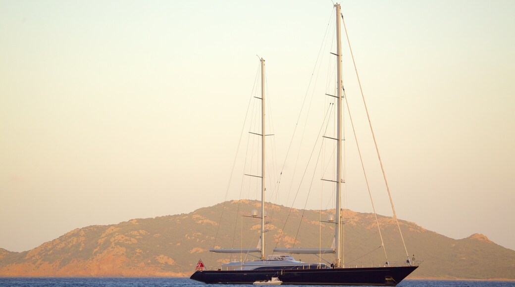 Plage de Balistra caracterizando um pĂŽr do sol e paisagens litorĂąneas