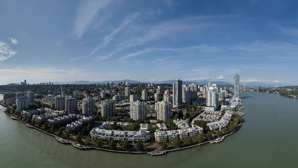Scenic Cityscape View with River and Skyscrapers. Vancouver, BC, Canada.