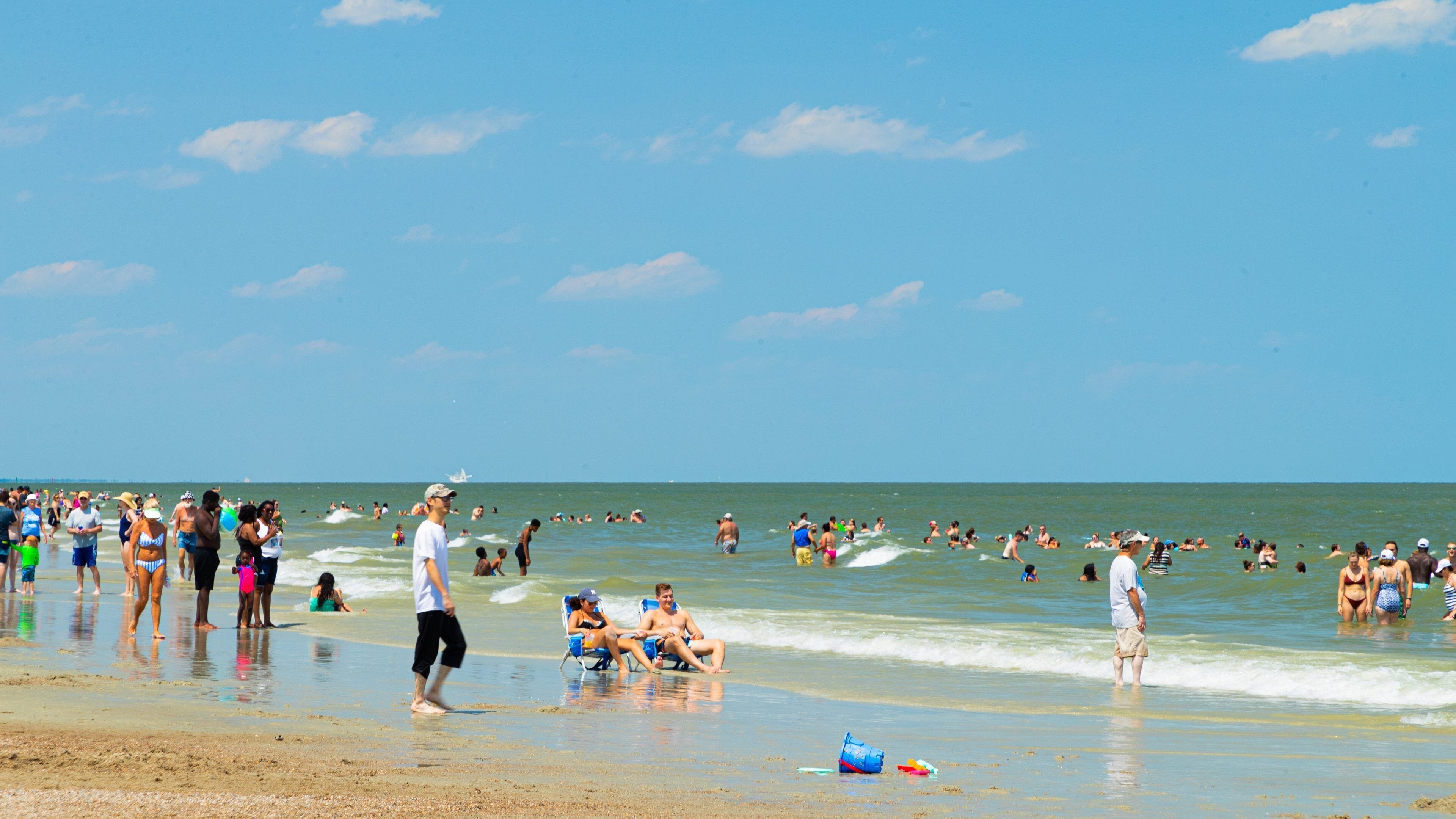 Tybee Island Beach featuring a sandy beach, general coastal views and swimming