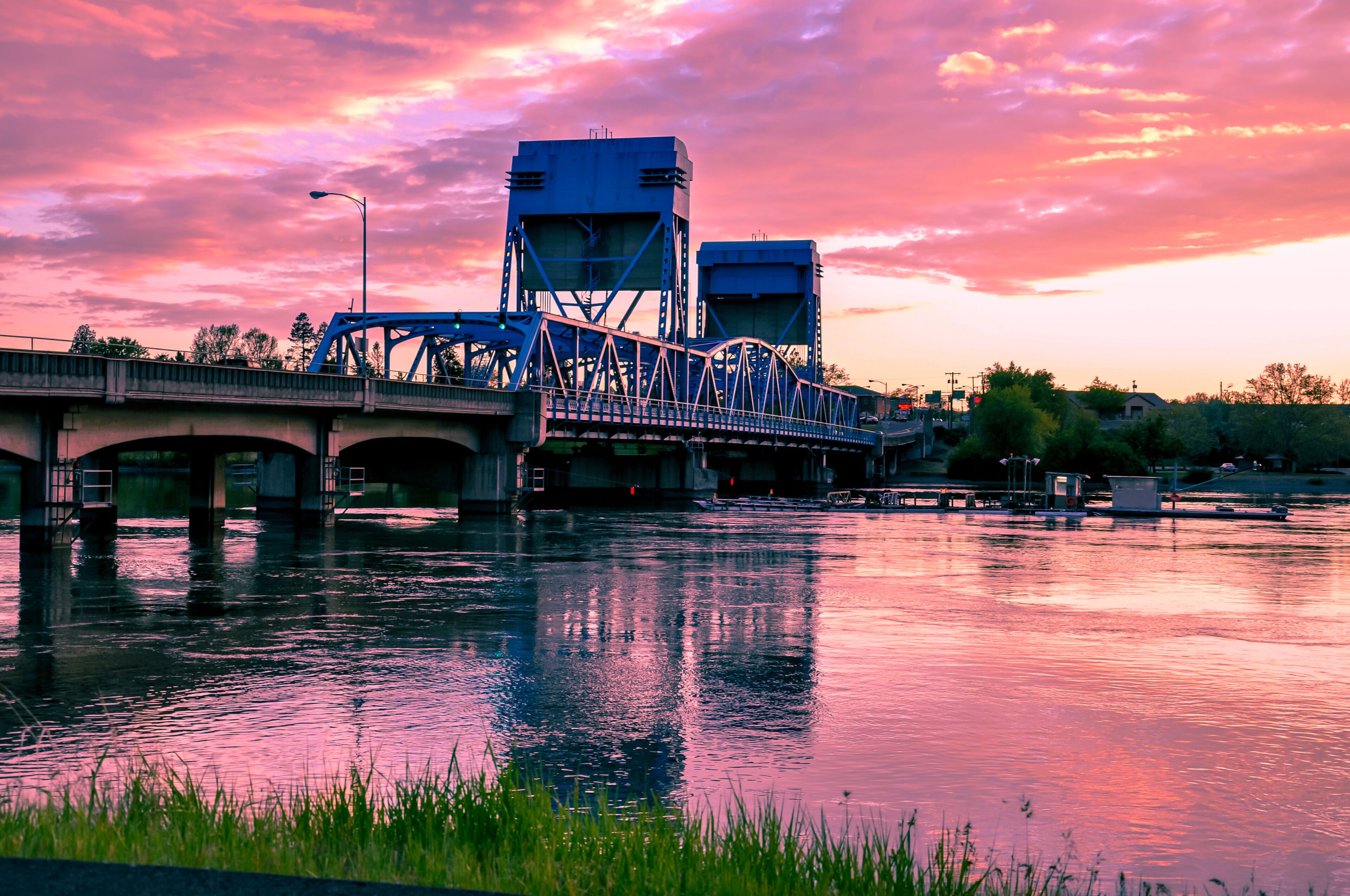 Lewiston - Clarkston blue bridge against vibrant twilight sky