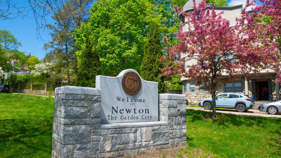 Welcome to Newton sign in spring on Commonwealth Avenue in Chestnut Hill, city of Newton, Massachusetts MA, USA.