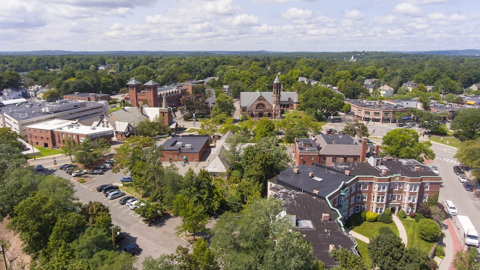 Lutheran Church, Sacred Heart Parish and First Baptist Church aerial view in Newton Centre, Massachusetts, USA.