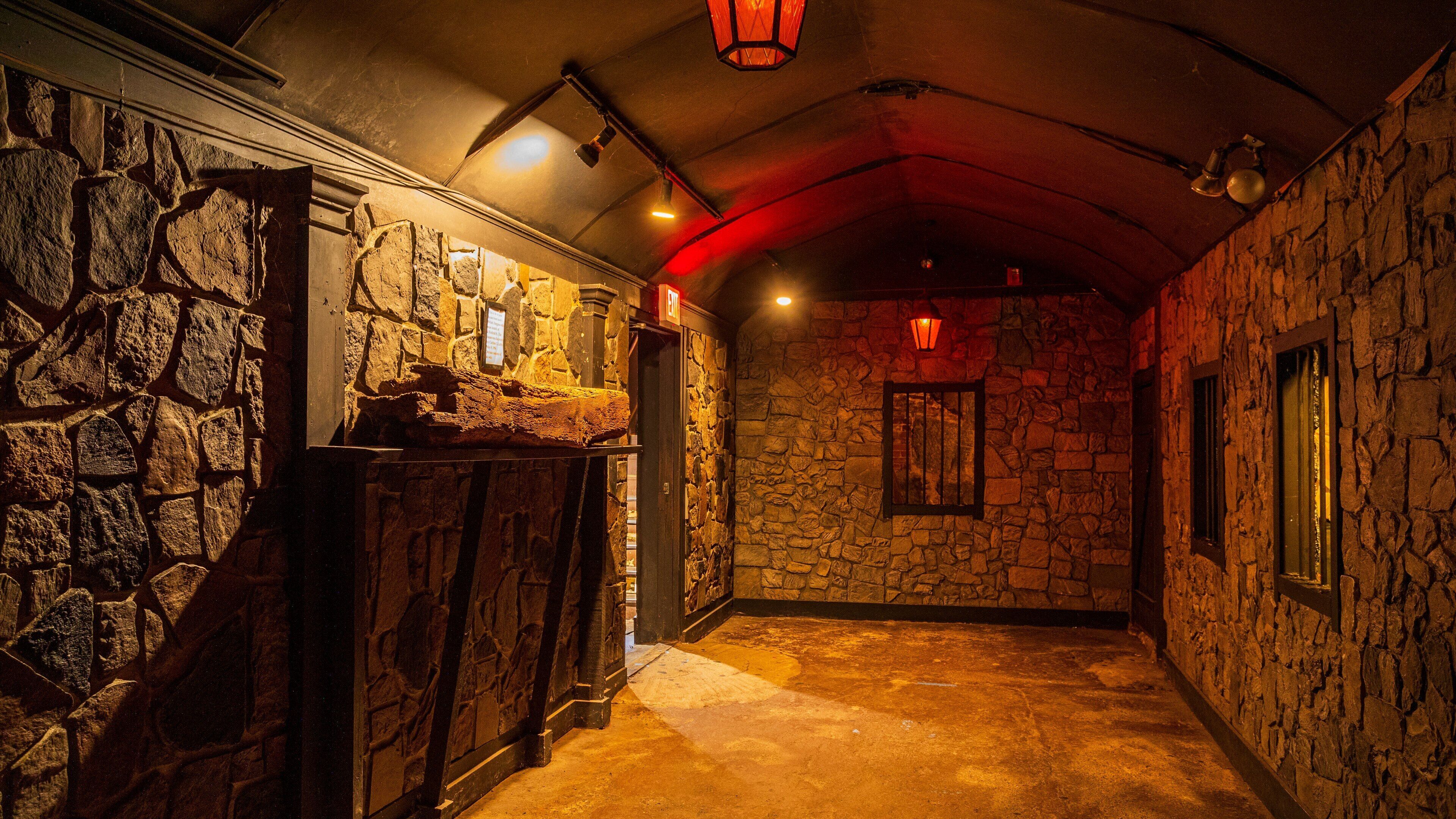 Witch Dungeon Museum featuring interior views