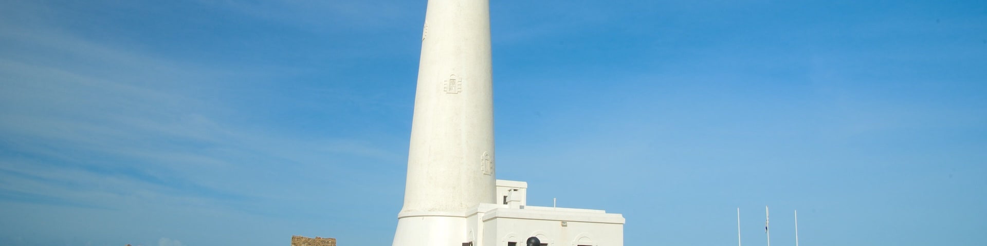 Cape Santa Maria Lighthouse which includes a lighthouse as well as an individual male