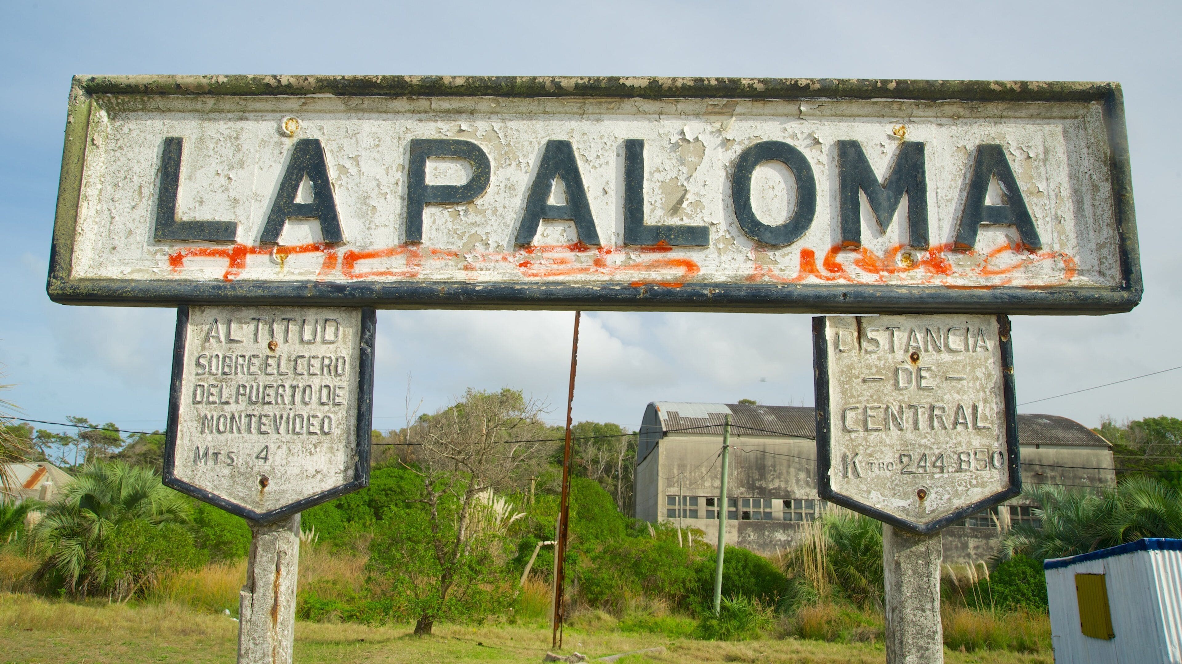 Old Train Station which includes a small town or village and signage