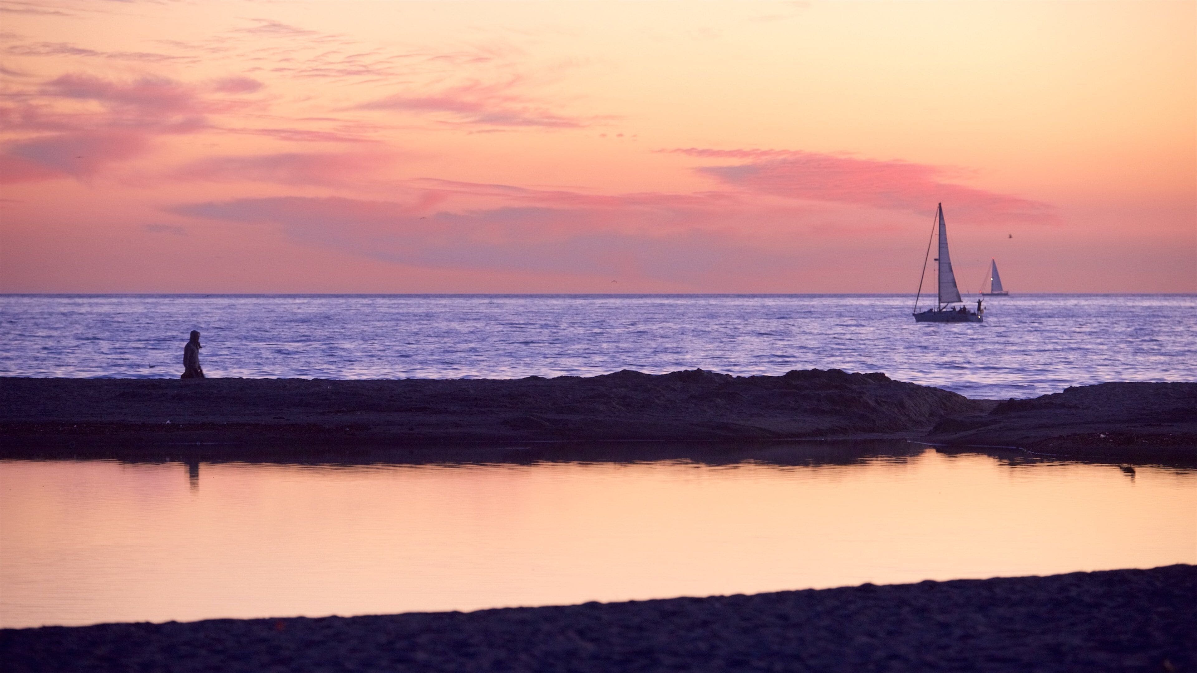 Santa Monica Beach featuring general coastal views and a sunset