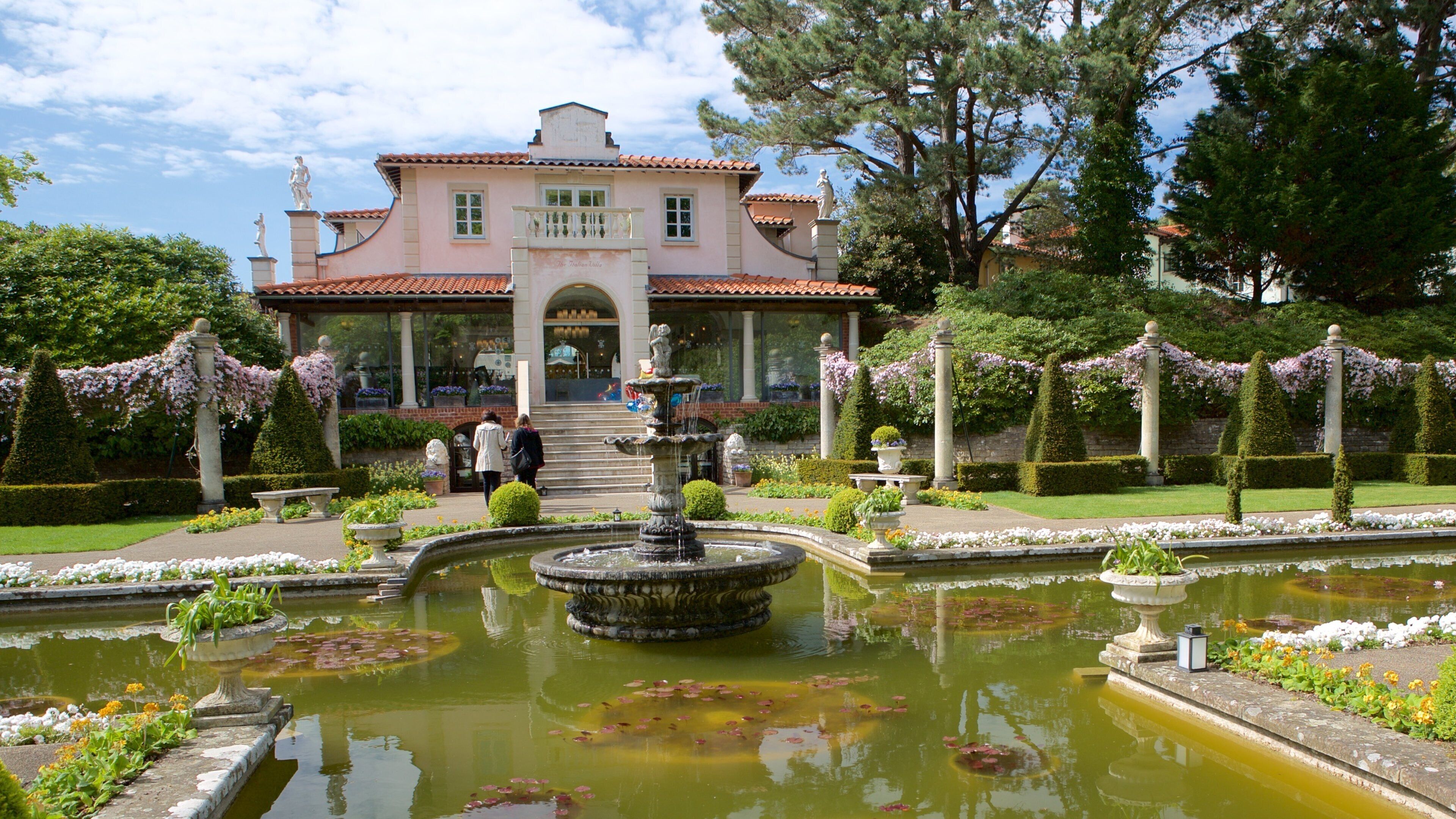 Compton Acres featuring a park, a fountain and heritage architecture