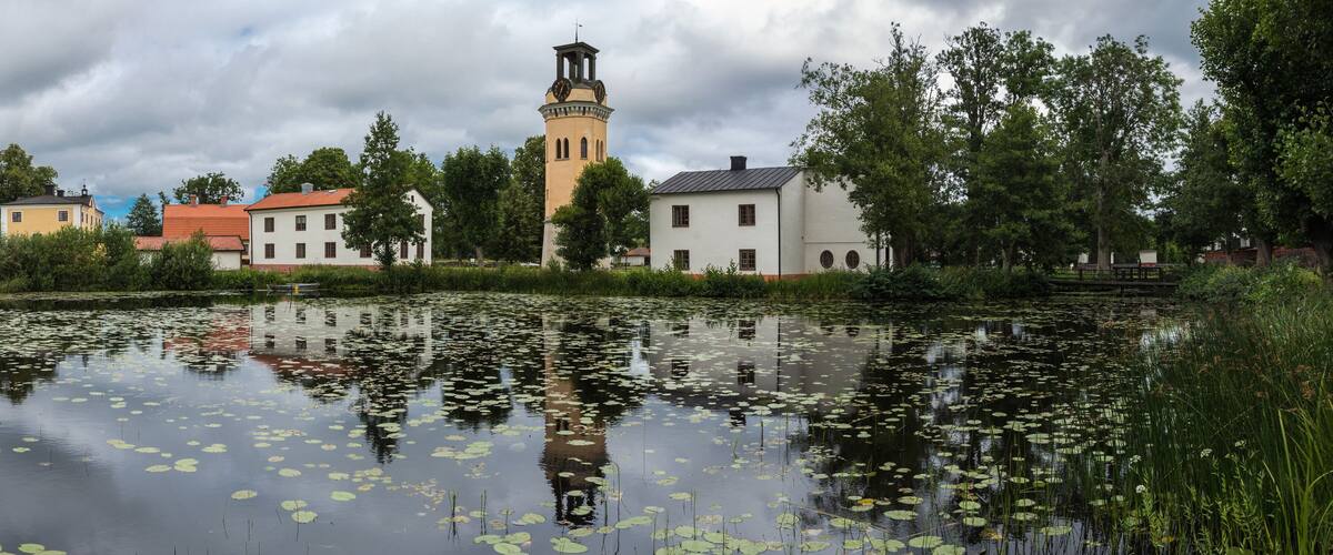 Forsmark, Osthammar - Sweden - Reflections of the vintage village in a small pond