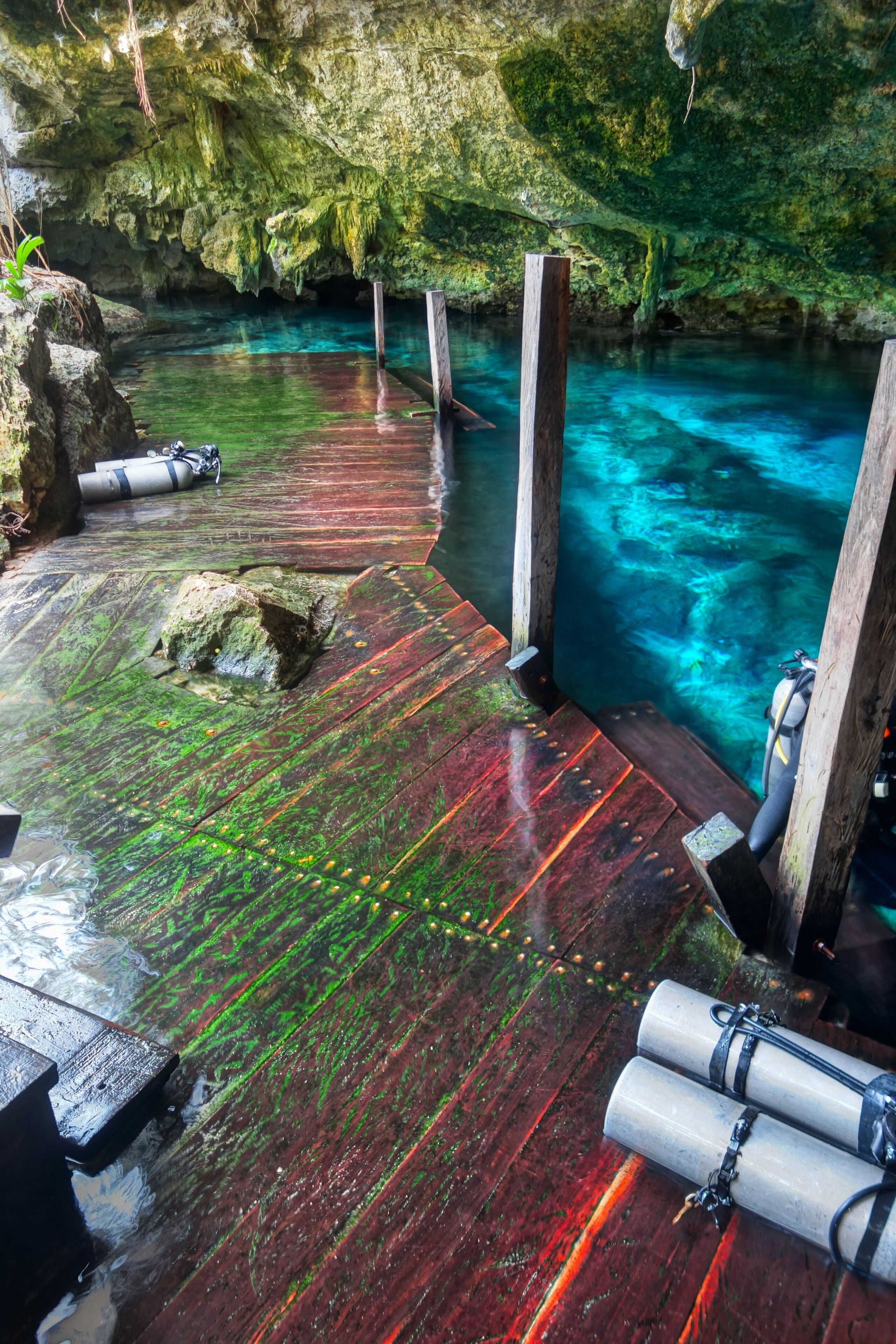 Wood Staircase and Diving Oxygen Bottles in Cenote Dos Ojos (Two Eyes) Underground Fresh Water Cavern near Tulum Mexico on Yucatan Peninsula