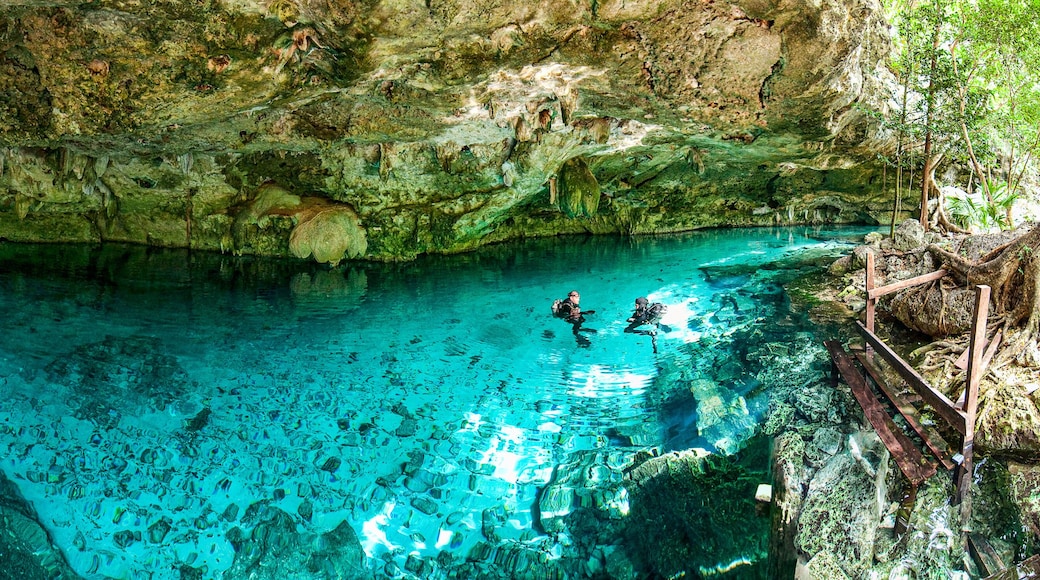 Cenote Dos Ojos - Cave Two Eyes - in Mexico, peninsula Yucatan with sparkling clear turquoise water and warm water