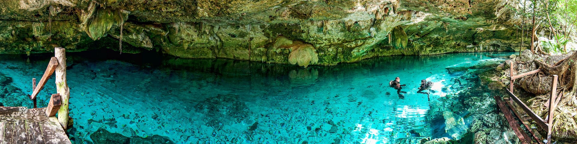 Cenote Dos Ojos - Cave Two Eyes - in Mexico, peninsula Yucatan with sparkling clear turquoise water and warm water