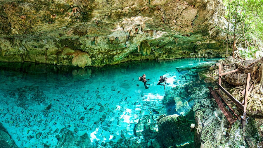 Cenote Dos Ojos - Cave Two Eyes - in Mexico, peninsula Yucatan with sparkling clear turquoise water and warm water