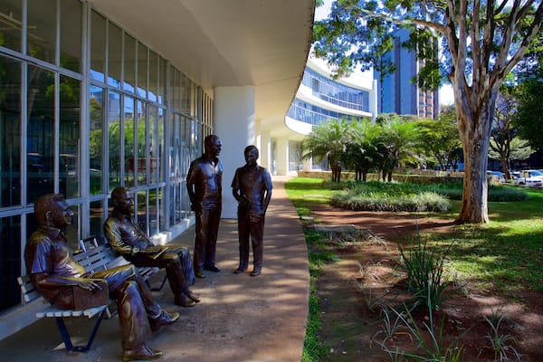 Biblioteca Publica Estadual Luiz de Bessa which includes a park, a statue or sculpture and outdoor art