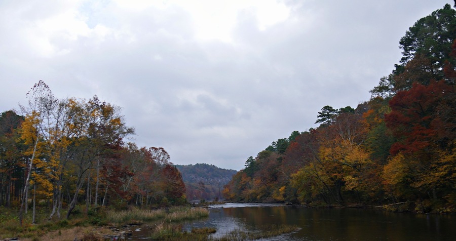 Panoramic view of colorful leaves of the trees along the Mountain Fork River at the Beavers Bend State Park in Broken Bow, Oklahoma