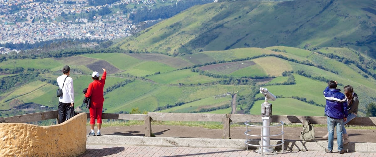 Quito Cable Car showing views and landscape views as well as a small group of people