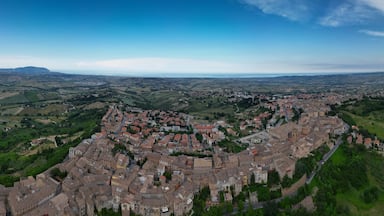 Italy, June 02, 2023: aerial view of the beautiful medieval village of Potenza Picena. The village is located on the Marche hills in the province of Macerata