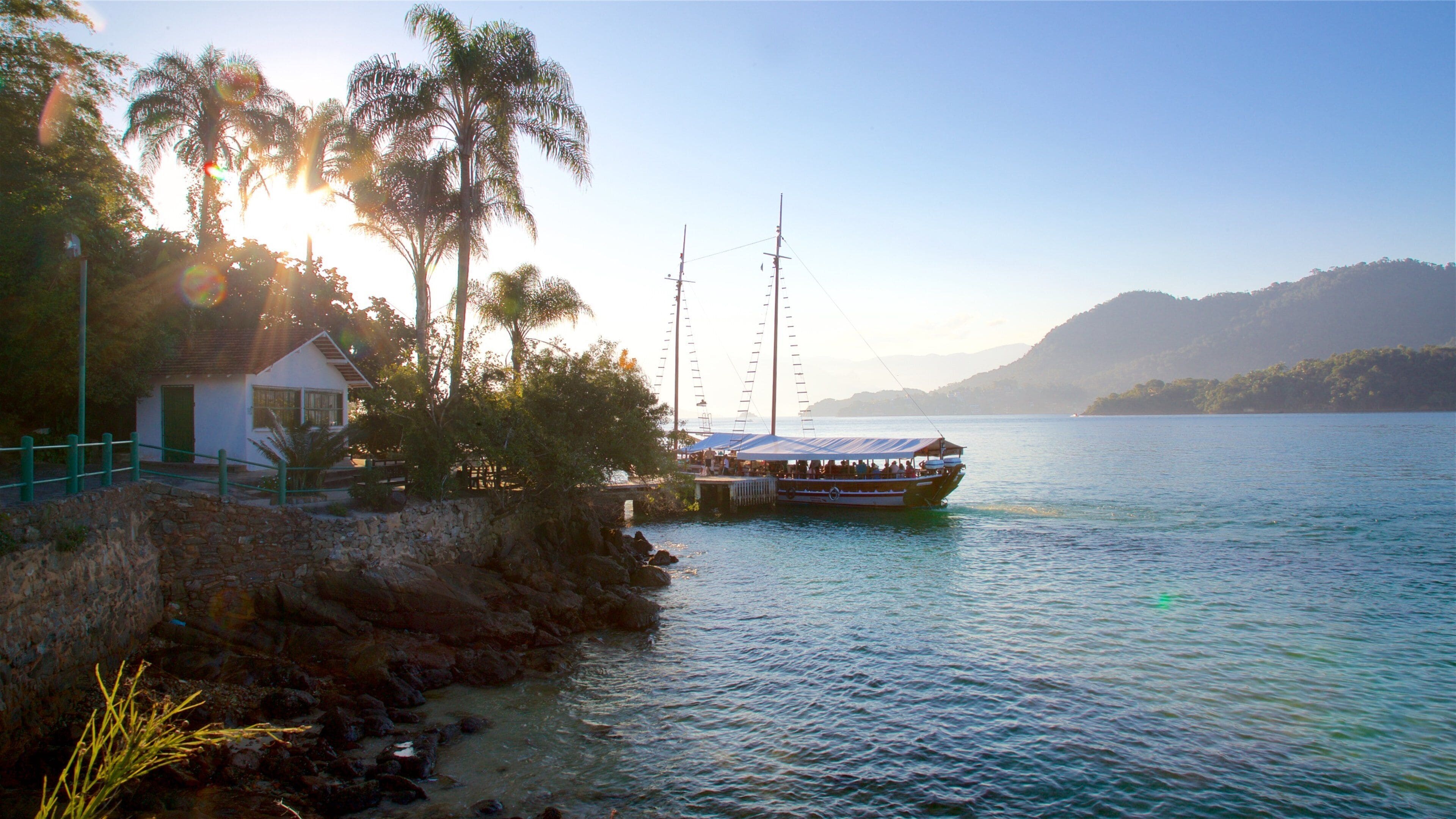 Gipoia Island showing a lake or waterhole and a sunset
