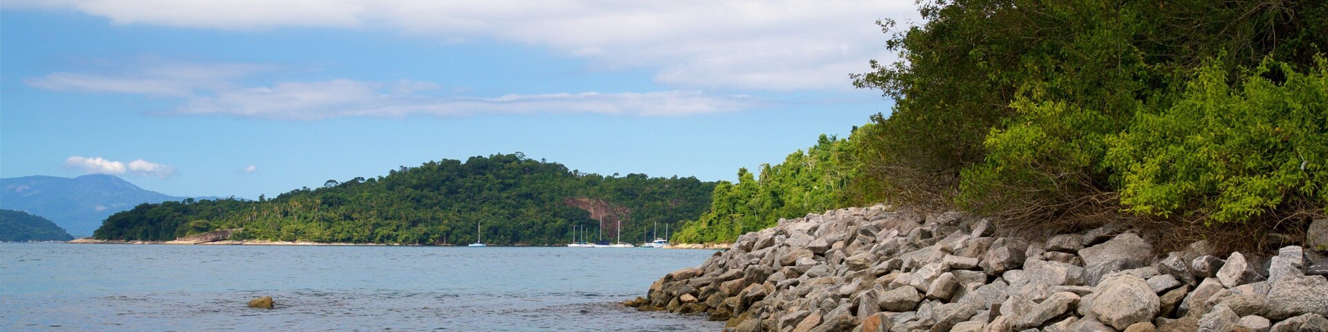 Laboratorio Beach featuring a sandy beach, rocky coastline and general coastal views
