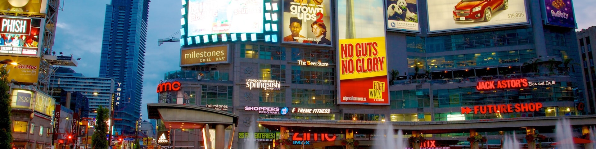 Yonge Street Shopping District showing night scenes, street scenes and a city