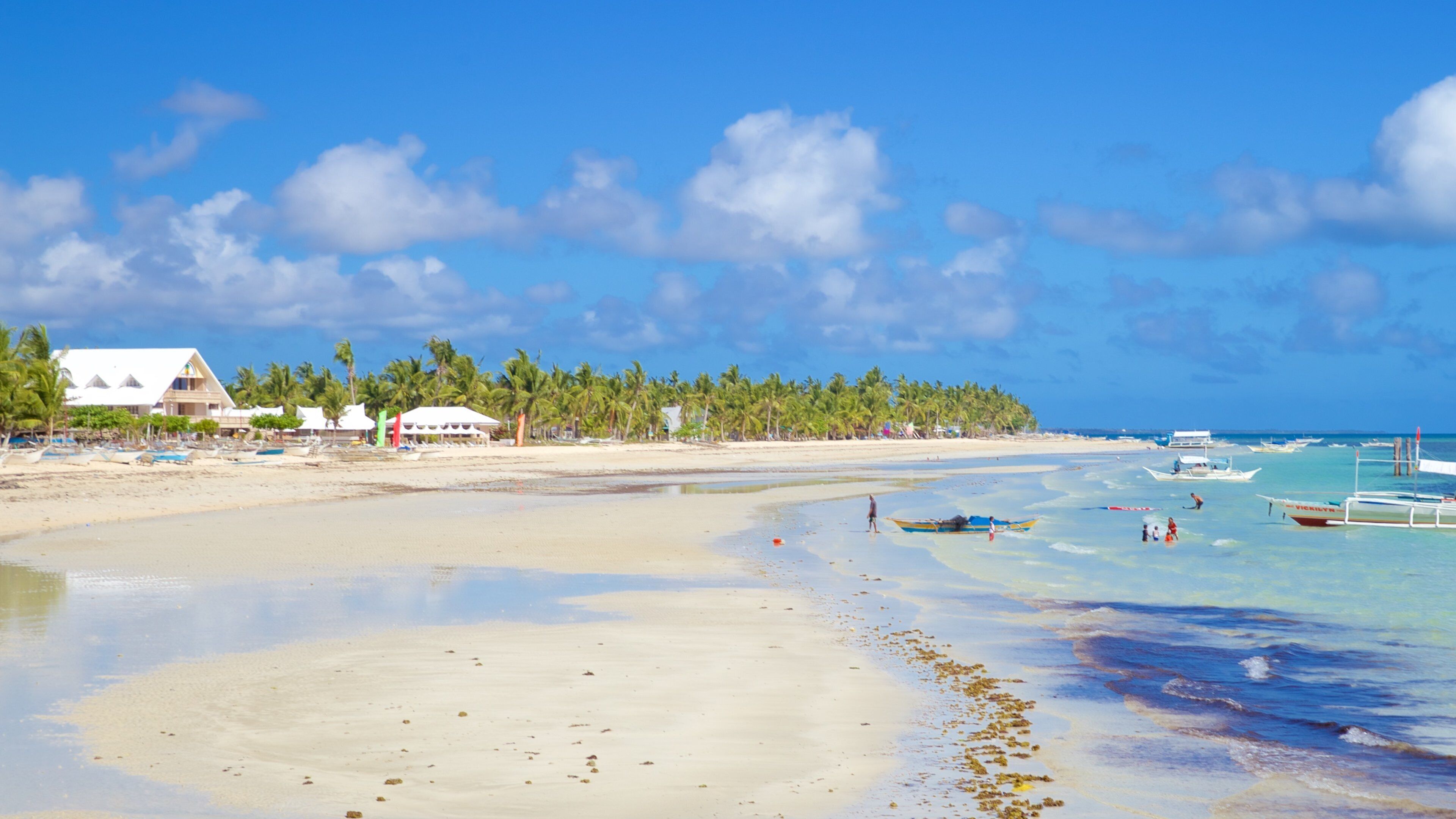 Santa Fe Færgeterminal som omfatter en sandstrand og udsigt over kystområde
